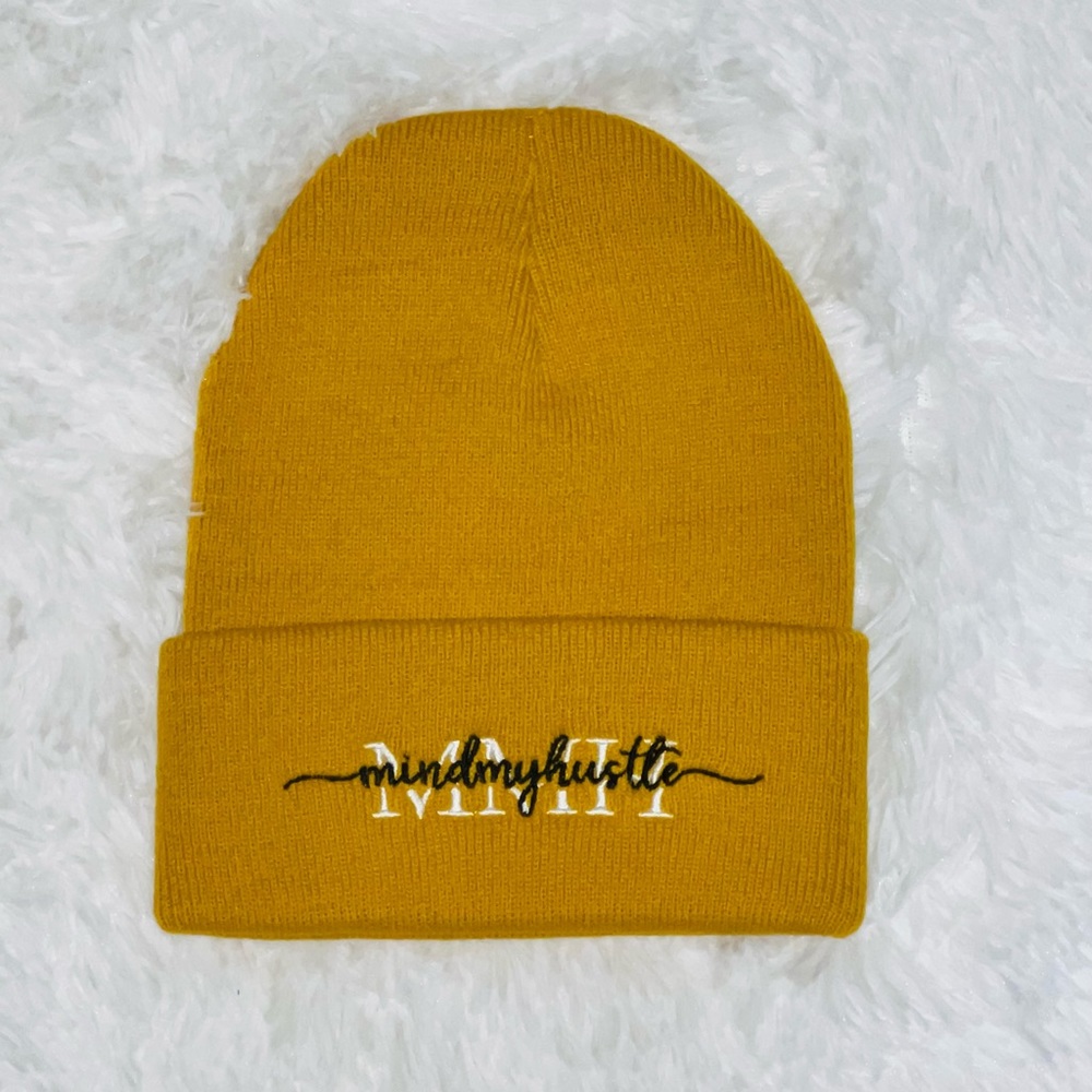 Custom Gold beanie from small business “MindMyHustle”.